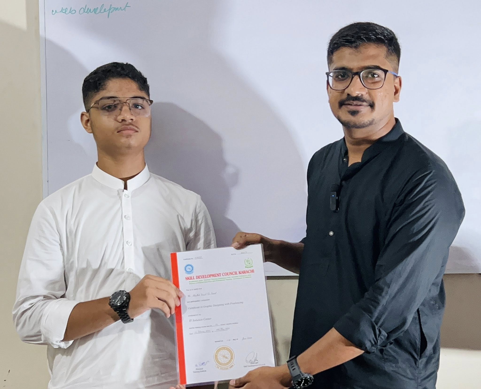 Student receiving certificate