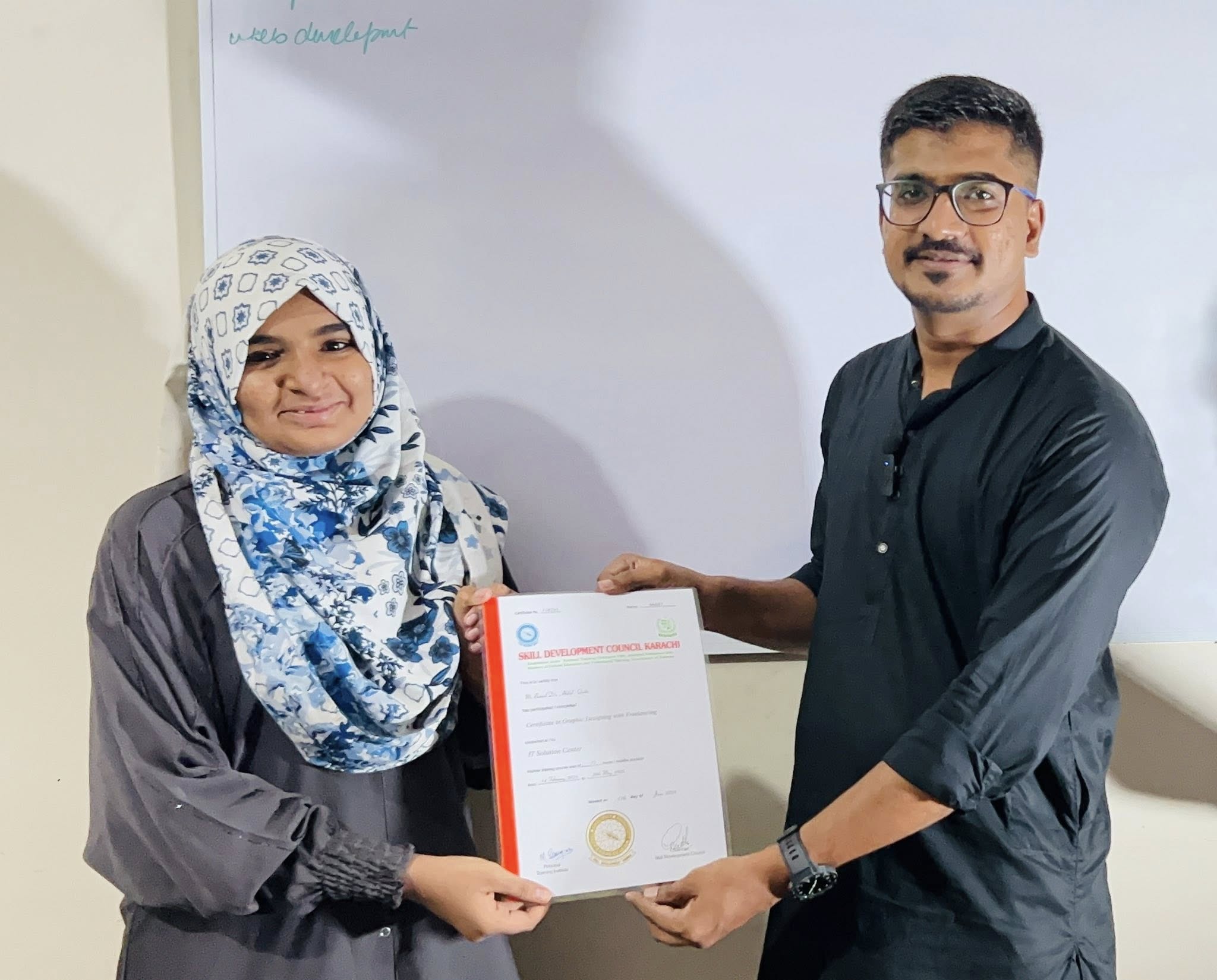 Student receiving certificate