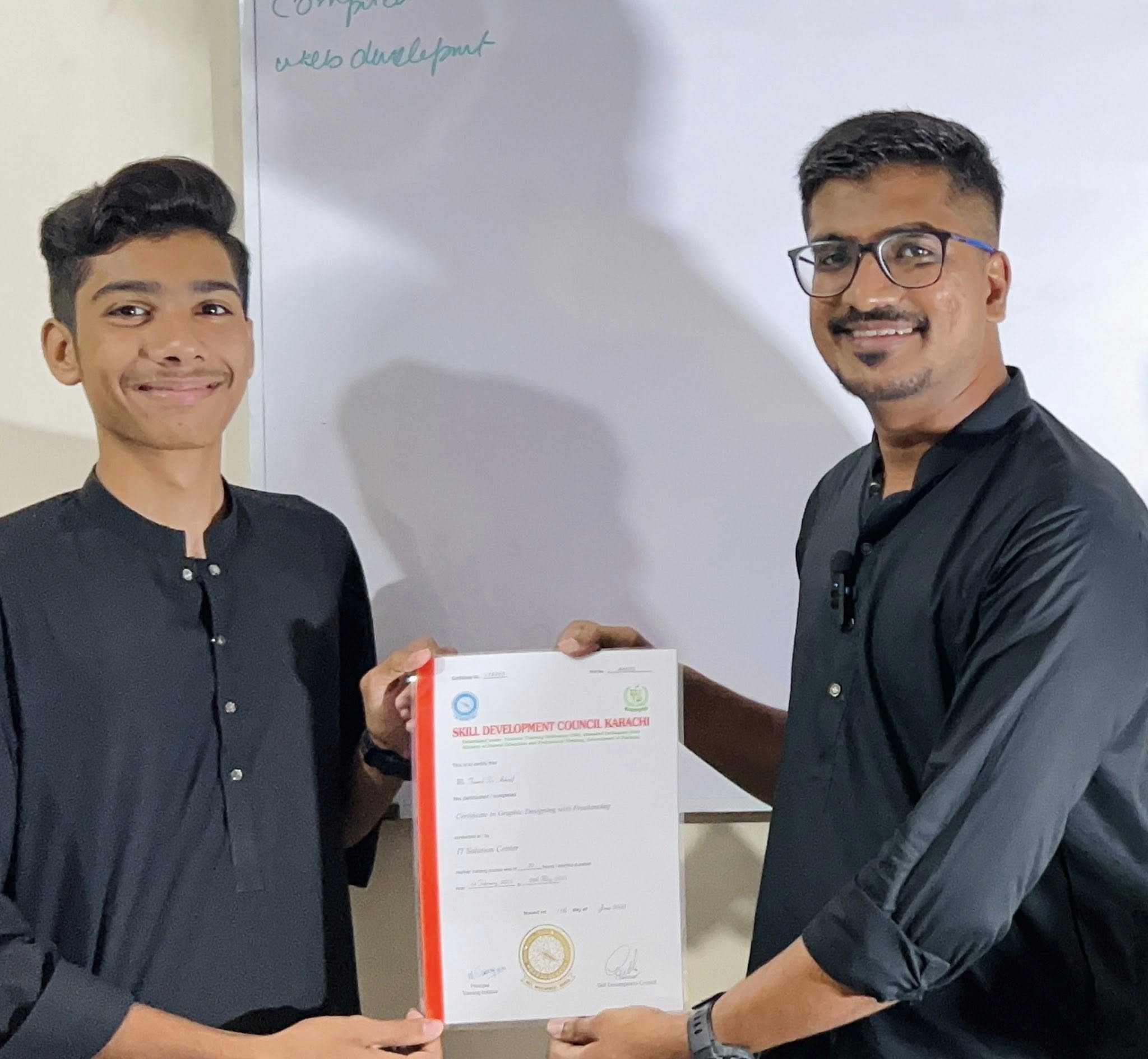 Student receiving certificate
