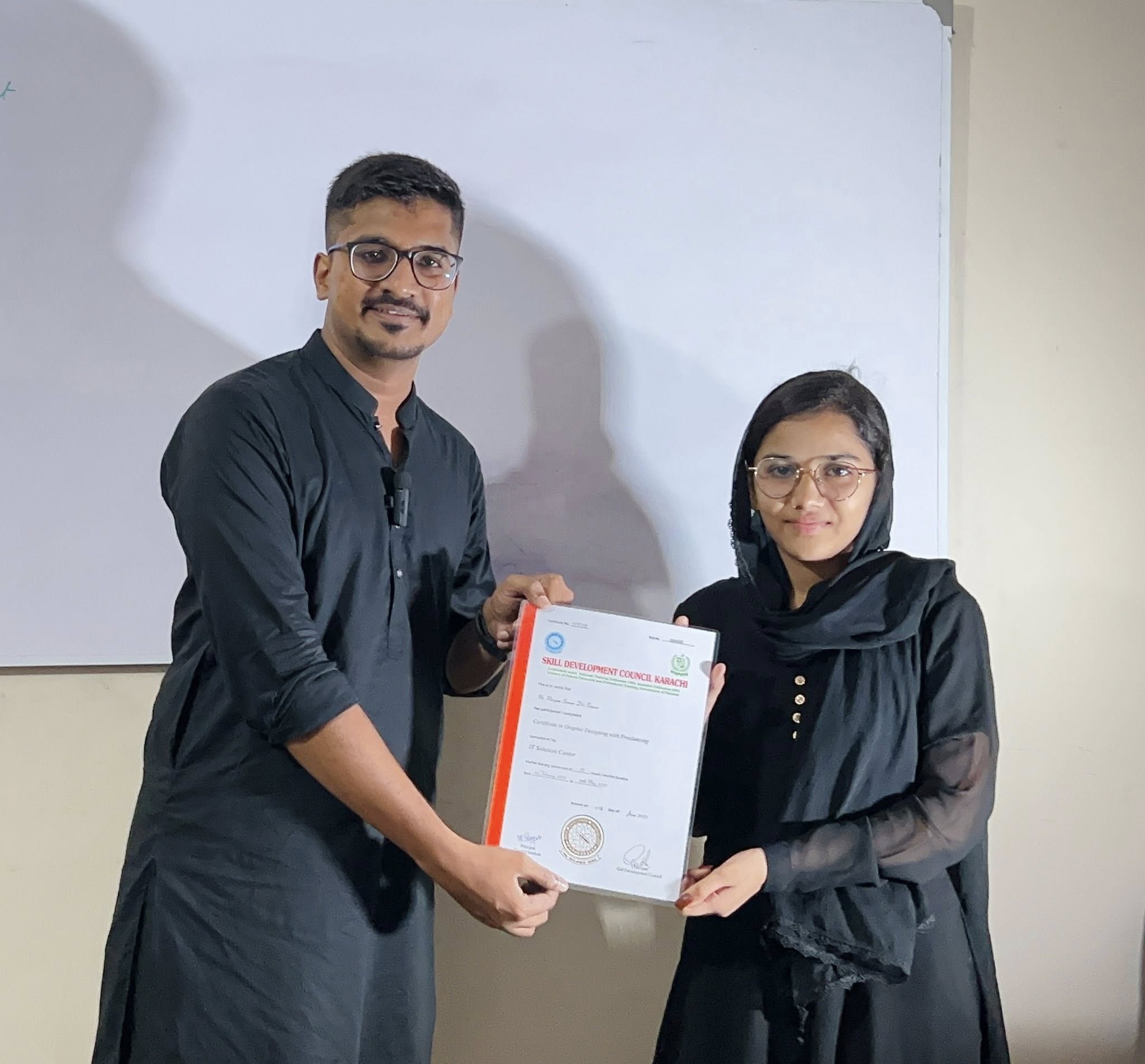 Student receiving certificate