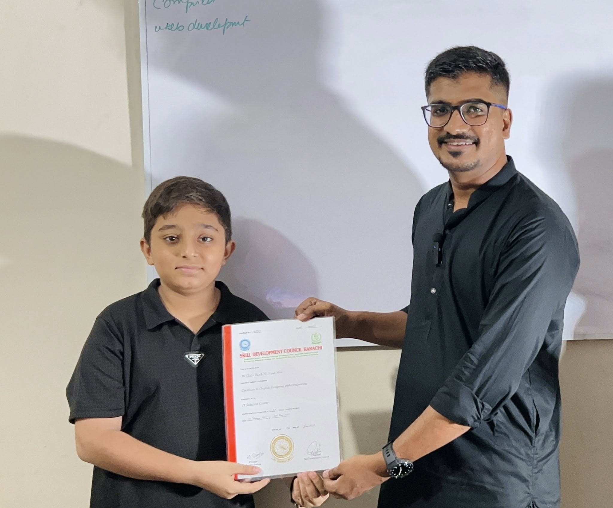 Student receiving certificate