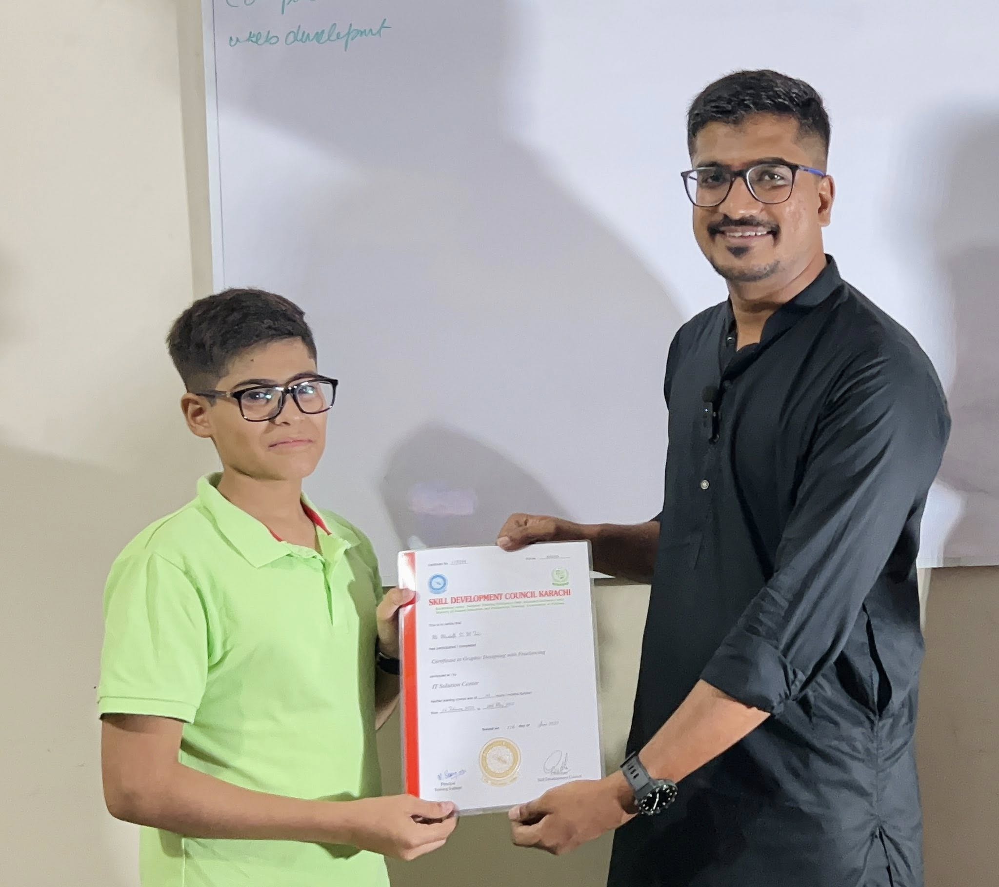 Student receiving certificate