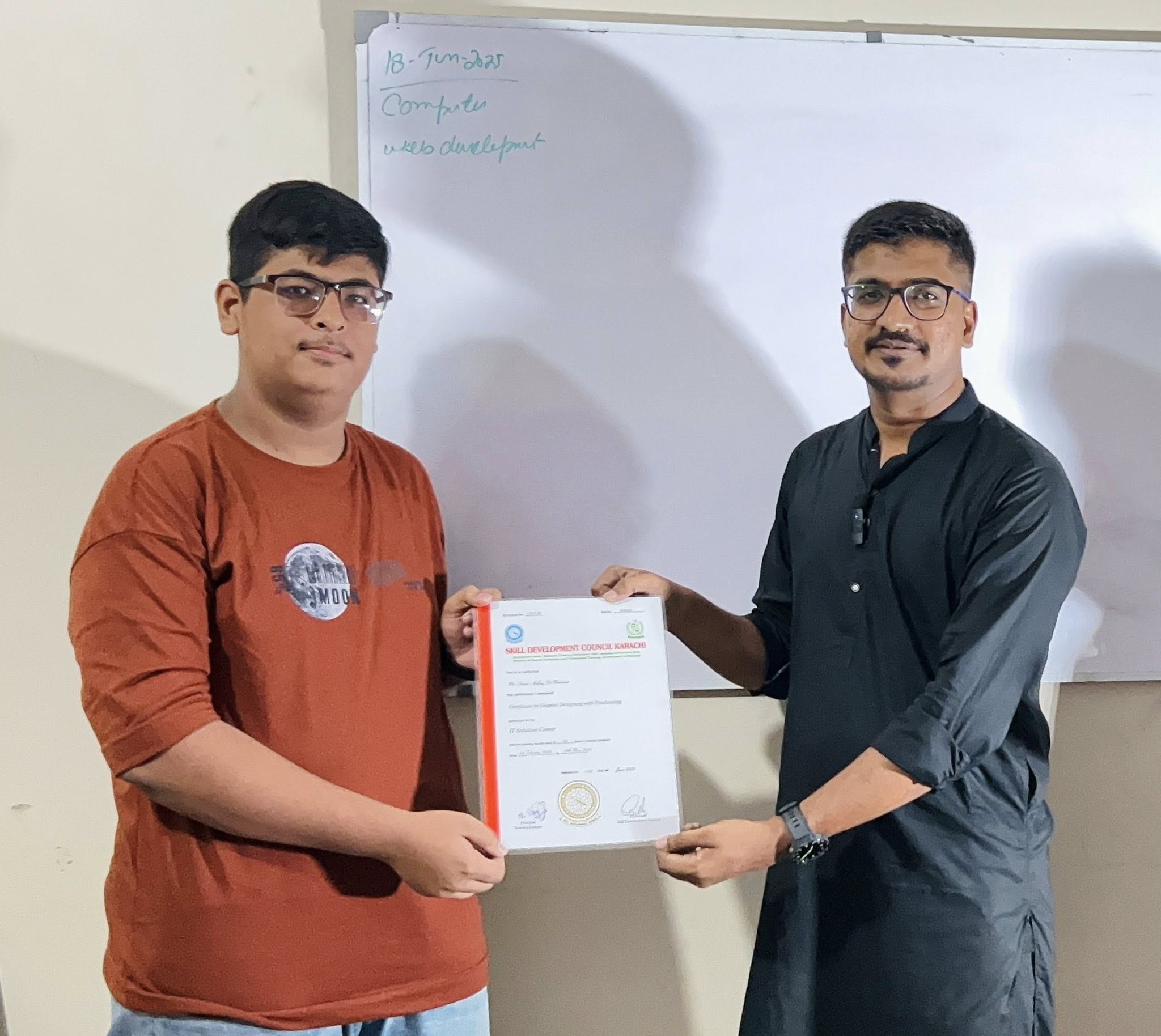 Student receiving certificate